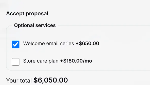 Client accepting a proposal: one of two optional services ticked, total $6,050